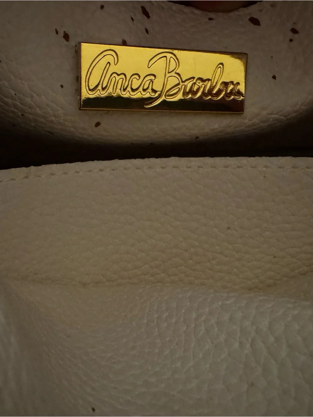 Anca Barbu white leather